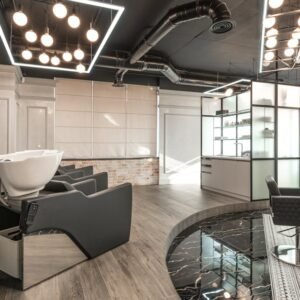 Stylish and spacious hair salon interior with contemporary design elements.